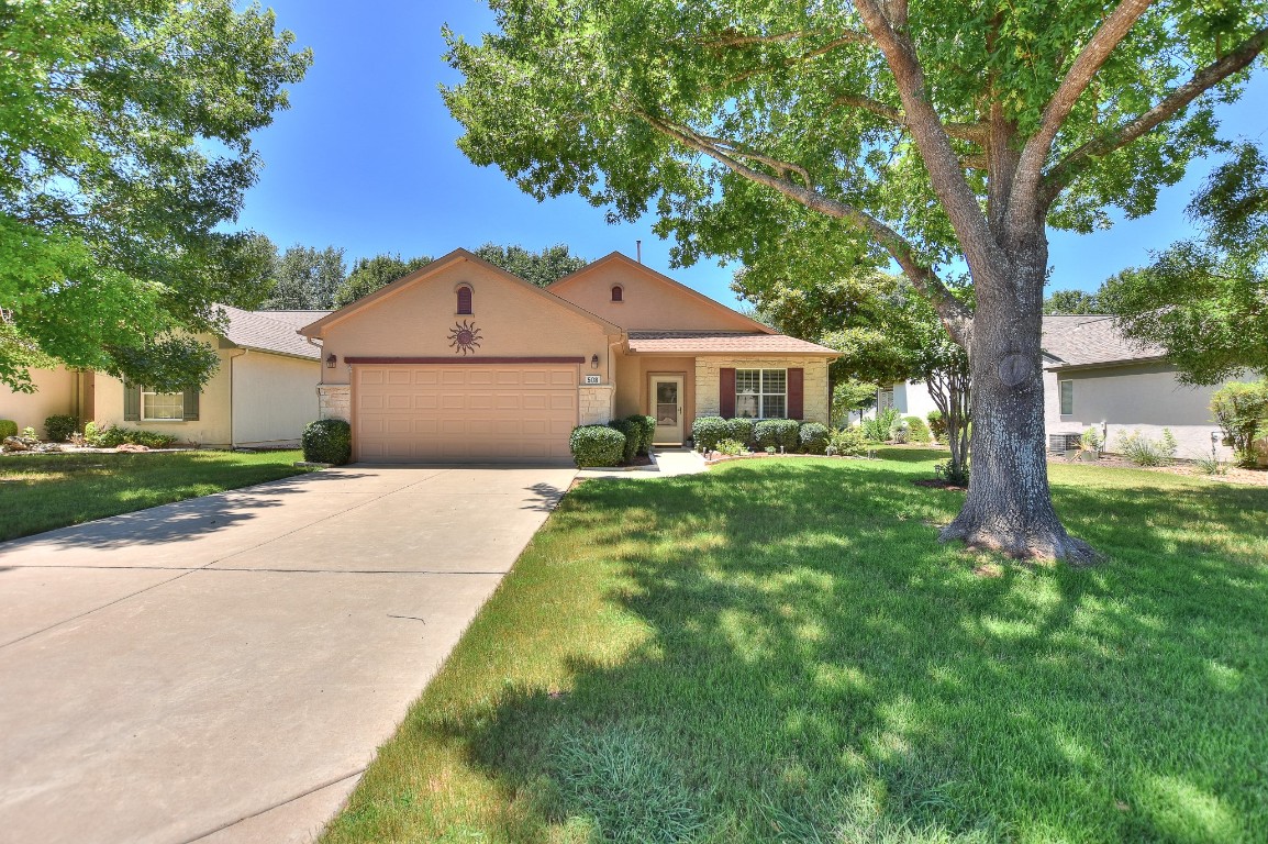 508 Texas Dr. Beautiful stucco and stone, large, level driveway.