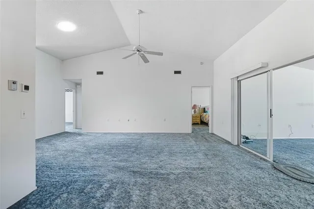 a view of a room that has a window in it