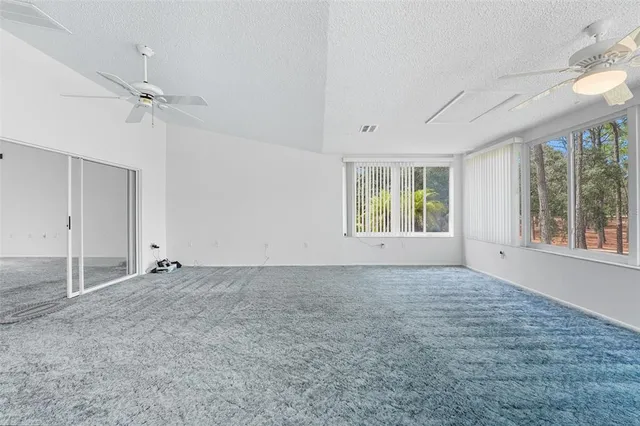 a kitchen with a sink and a washer dryer