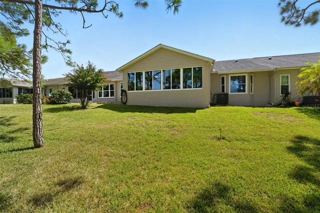 a view of a lake with a yard