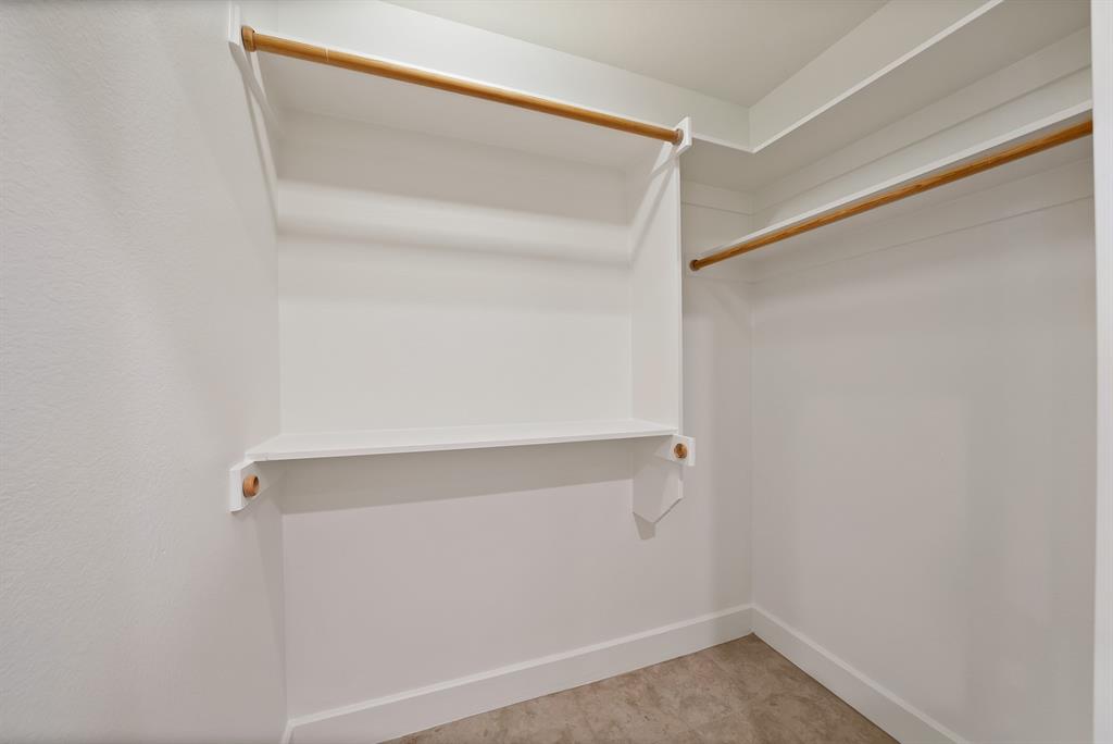 2420 Hugo Street, Unit 3 Dallas, TX 75204 - Photo 22 of 36 a view of small space with racks on the wall