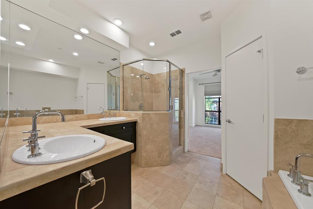 2420 Hugo Street, Unit 3 Dallas, TX 75204 - Photo 25 of 36 a kitchen with stainless steel appliances a sink stove and refrigerator