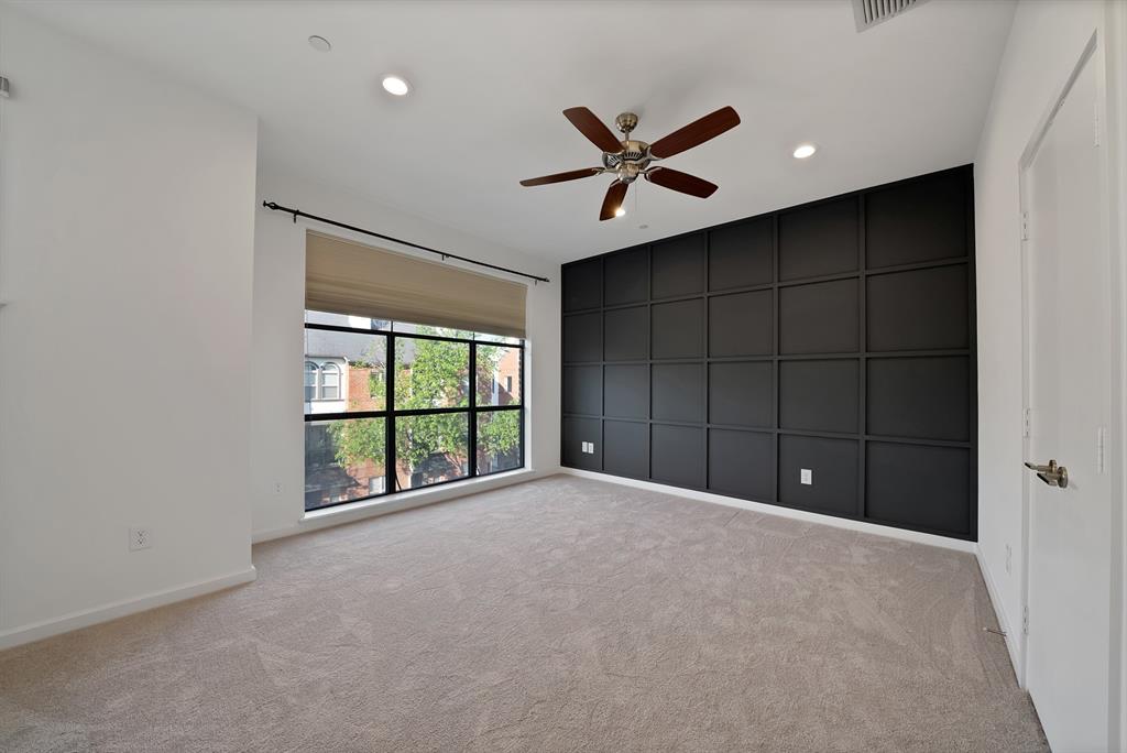 2420 Hugo Street, Unit 3 Dallas, TX 75204 - Photo 30 of 36 a view of an empty room with a window