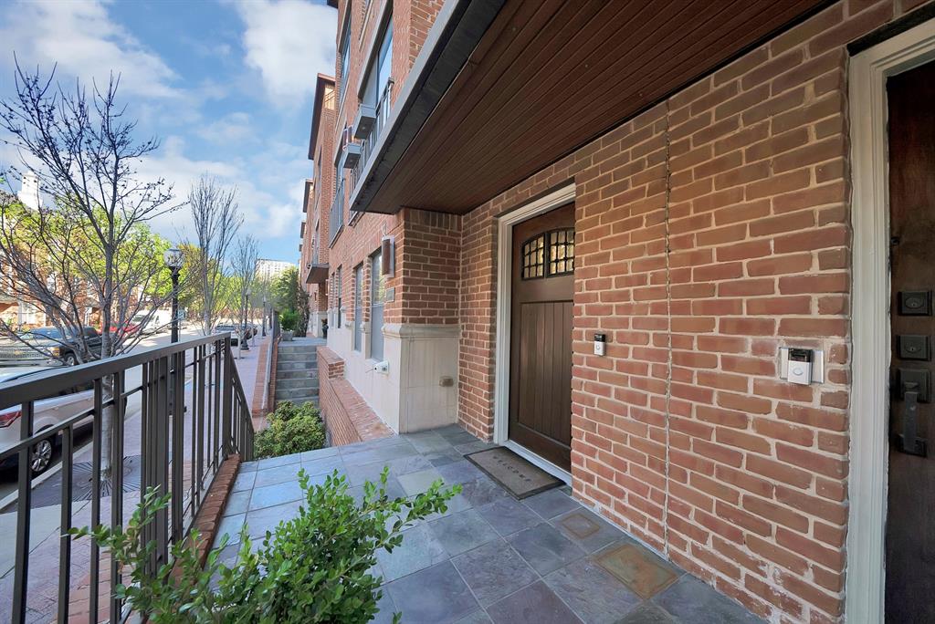 2420 Hugo Street, Unit 3 Dallas, TX 75204 - Photo 5 of 36 a view of a pathway with a house