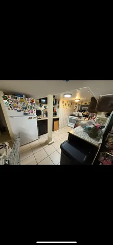 a picture of a living room with furniture