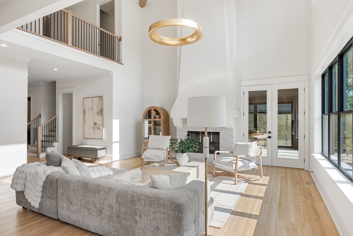 5619 Valley View Road Brentwood, TN 37027 - Photo 14 of 55 a living room with furniture and a large mirror