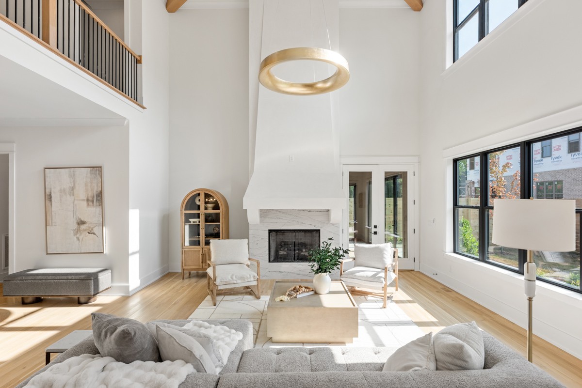 5619 Valley View Road Brentwood, TN 37027 - Photo 15 of 55 a living room with furniture and a fireplace