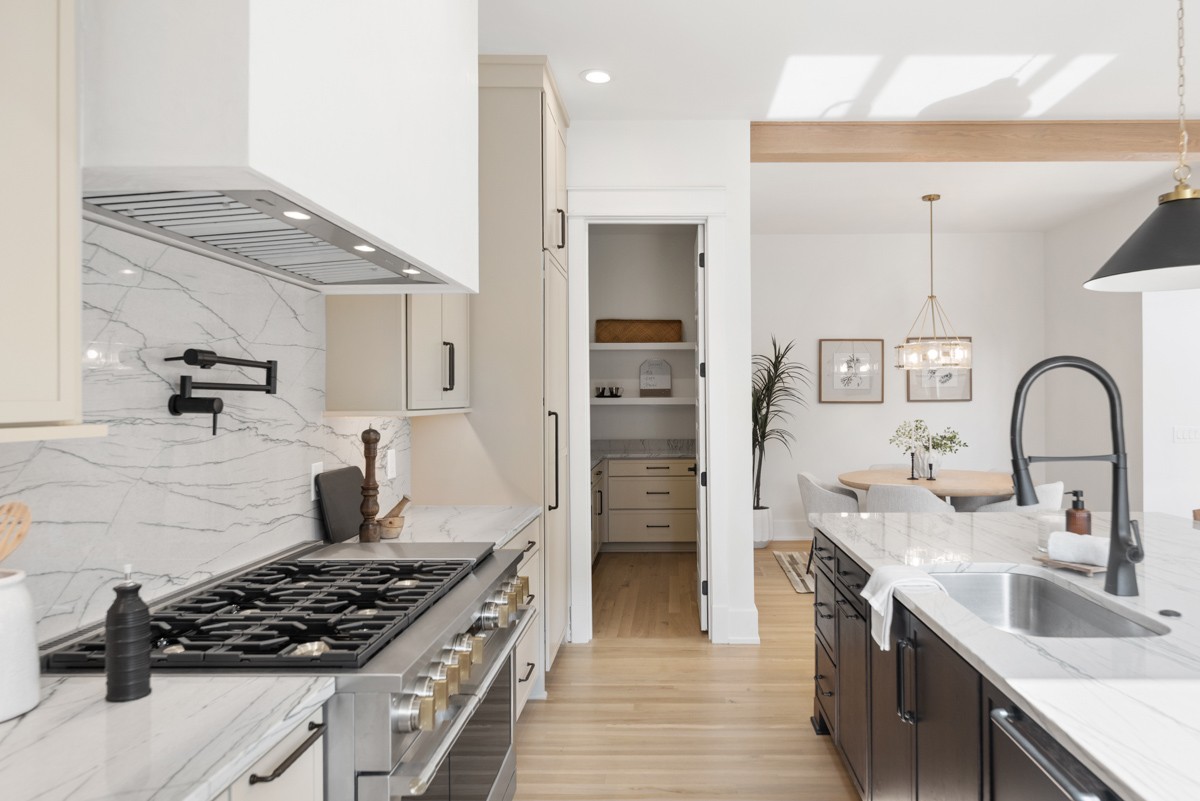 5619 Valley View Road Brentwood, TN 37027 - Photo 19 of 55 a kitchen with stainless steel appliances a stove a sink and a refrigerator