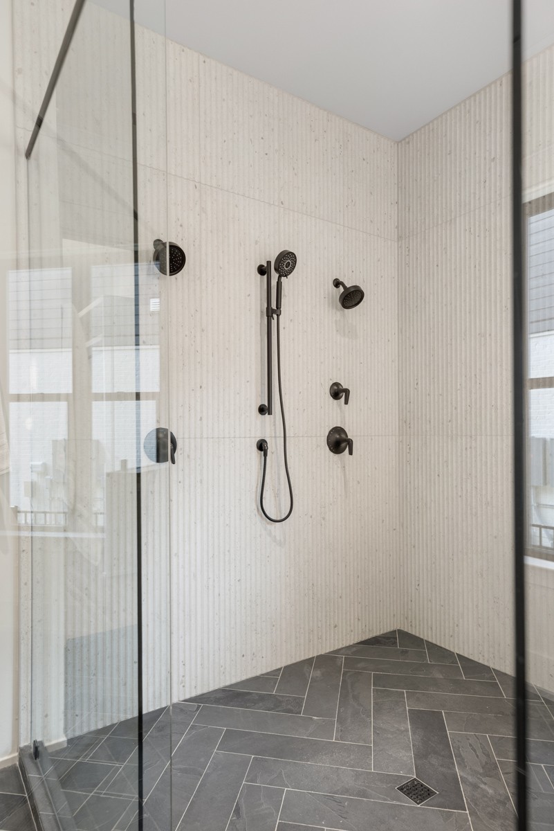 5619 Valley View Road Brentwood, TN 37027 - Photo 29 of 55 a bathroom with a glass shower door