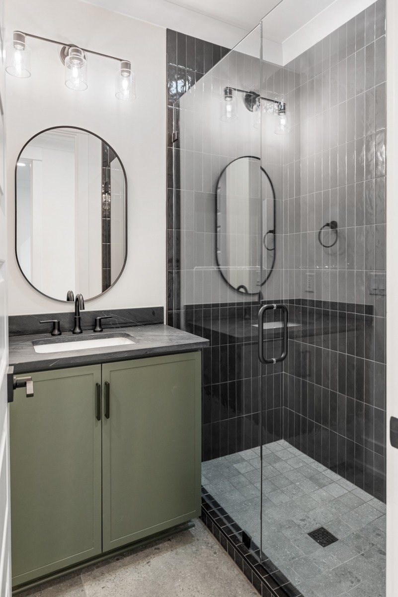 5619 Valley View Road Brentwood, TN 37027 - Photo 39 of 55 a bathroom with a sink and a mirror