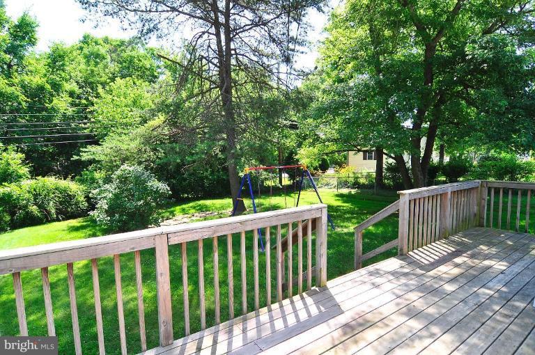 5729 Oakland Road Halethorpe, MD 21227 - Photo 12 of 18 a view of a wooden deck next to a yard