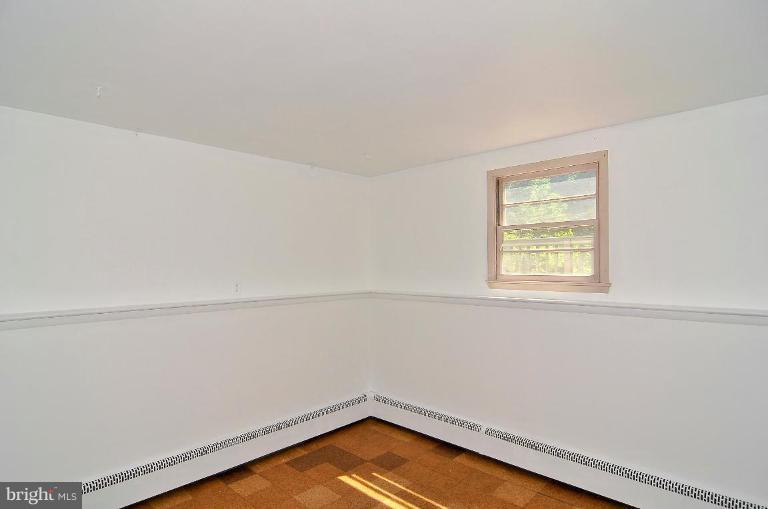 5729 Oakland Road Halethorpe, MD 21227 - Photo 16 of 18 a view of a room with rack on the wall