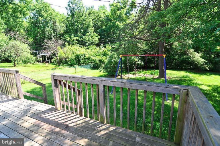 5729 Oakland Road Halethorpe, MD 21227 - Photo 18 of 18 a balcony with wooden floor and outdoor space