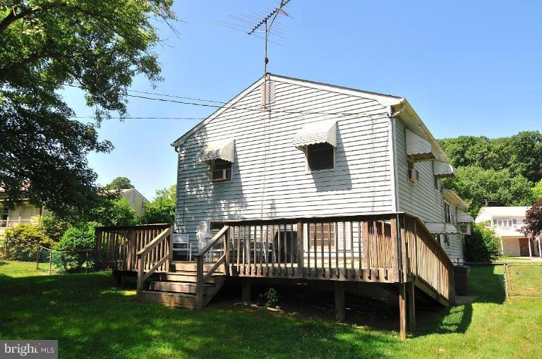 5729 Oakland Road Halethorpe, MD 21227 - Photo 7 of 18 a view of a house with a yard