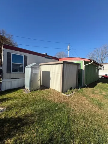 a view of a house with a garage