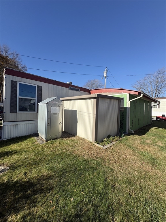 557 Southwest Cutoff, Unit 17 Worcester, MA 01607 - Photo 16 of 19 a view of a house with a garage