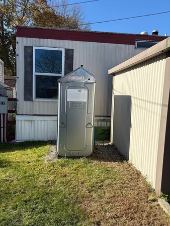 a view of a house with backyard