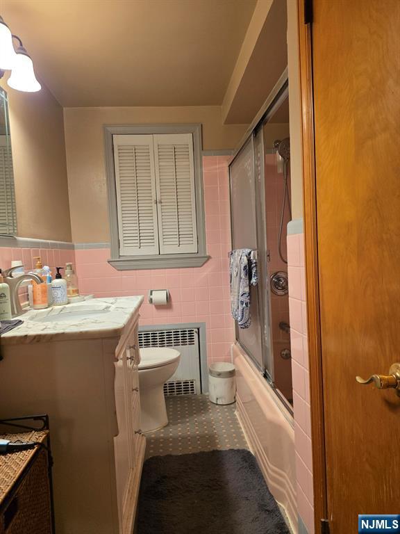 214 Newark Avenue, Unit 2 Lyndhurst, NJ 07071 - Photo 11 of 13 a bathroom with a sink and a mirror
