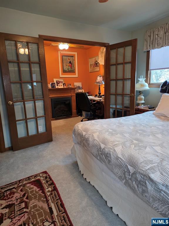 214 Newark Avenue, Unit 2 Lyndhurst, NJ 07071 - Photo 13 of 13 a bedroom with a bed and wooden floor