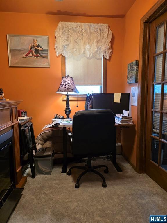 214 Newark Avenue, Unit 2 Lyndhurst, NJ 07071 - Photo 8 of 13 a view of a workspace with furniture and a window