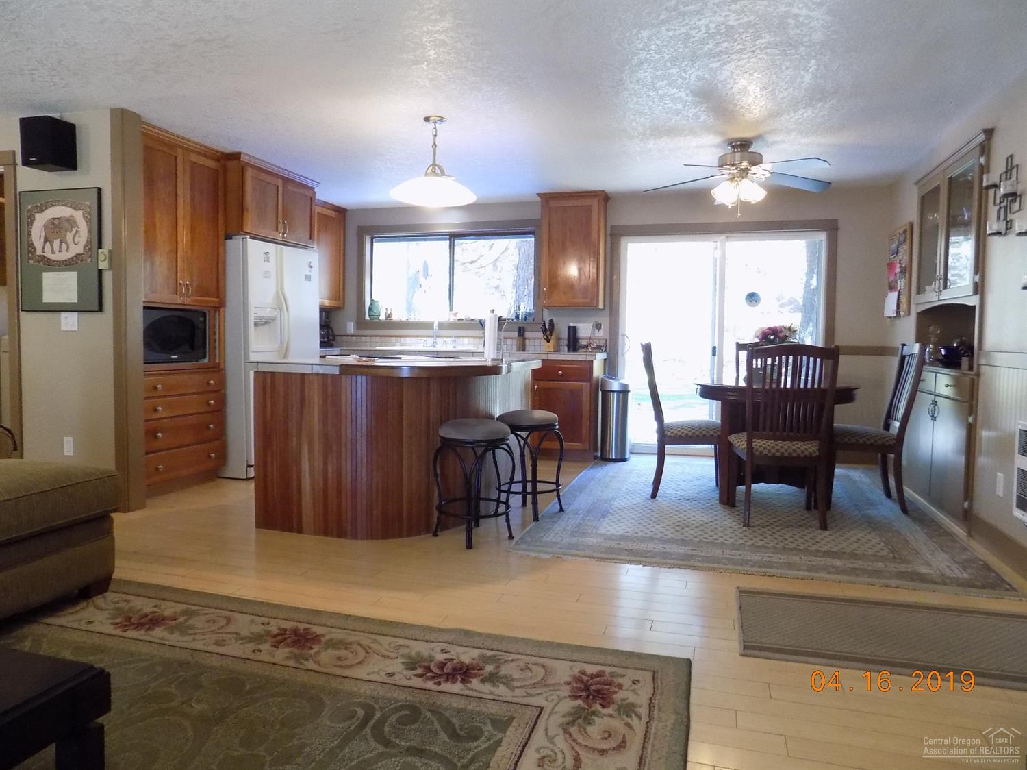 18853 Shoshone Road Bend, OR 97702 - Photo 5 of 25 The cherry cabinets in the kitchen were