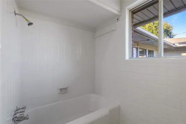 a bathroom with a bathtub
