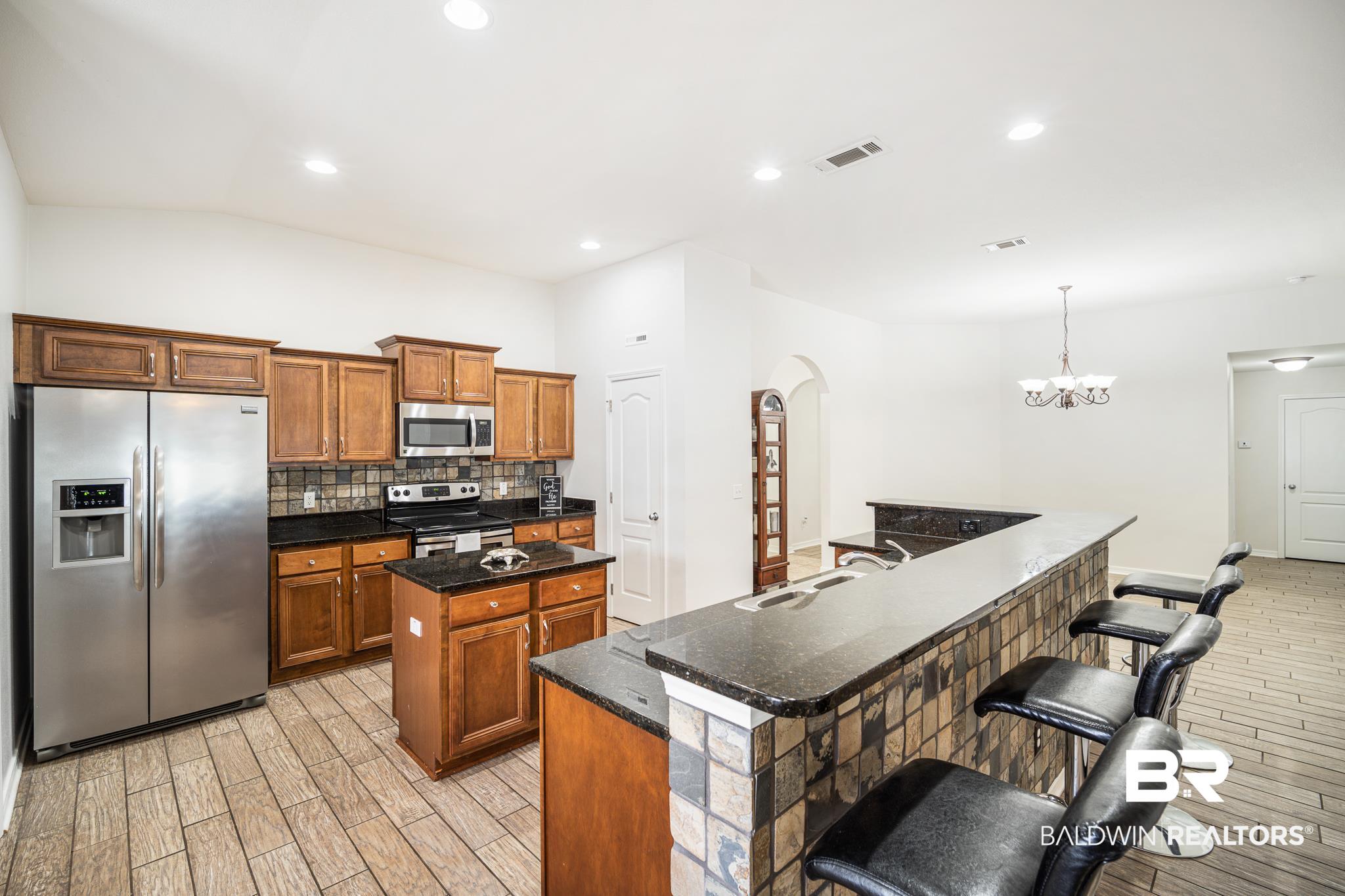145 Meadow Run Loop West Foley, AL 36535 - Photo 10 of 32 Bfst to Kitchen & DR