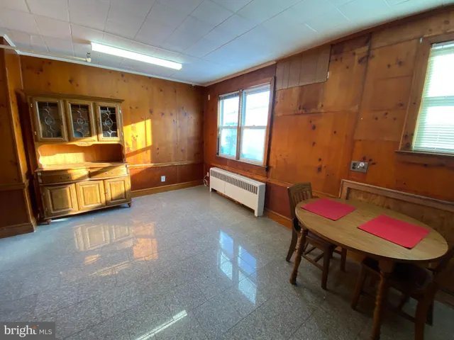 a room with furniture and window