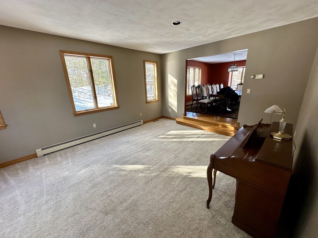 42 Pine Acres Road Foxboro, MA 02035 - Photo 18 of 40 a view of a room with gym equipment