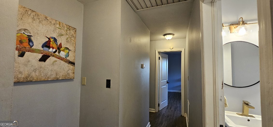 1976 Columbia Drive Decatur, GA 30032 - Photo 7 of 11 view of a bathroom with tub and mirror