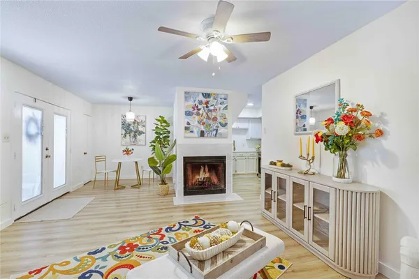 a view of a swimming pool with a patio