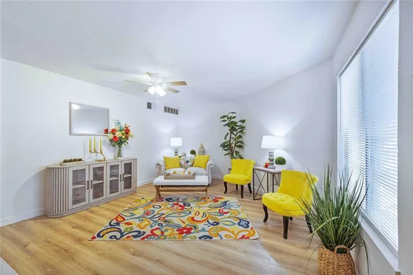 a view of swimming pool with outdoor seating