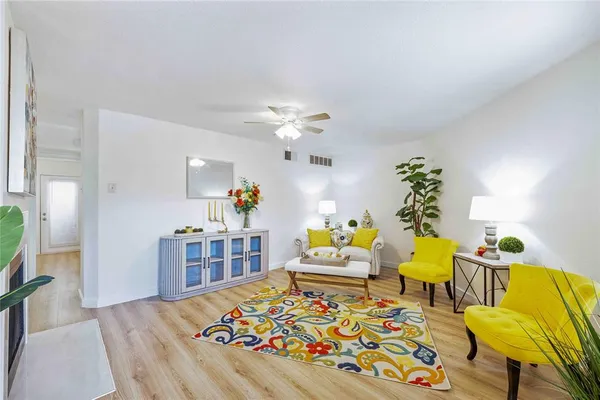 a living room with furniture and a table