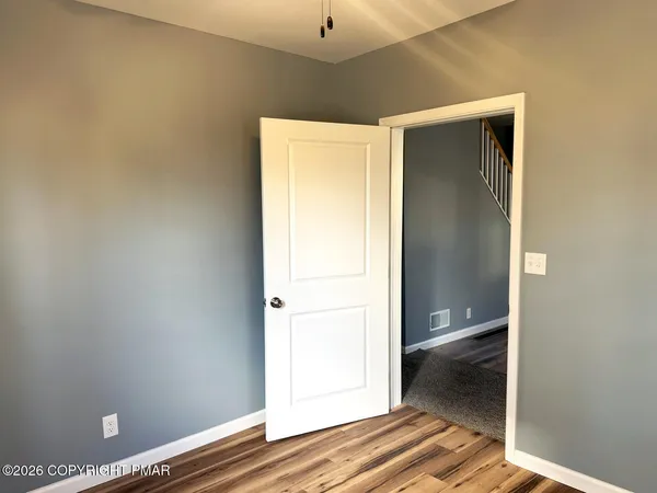 a kitchen with a sink cabinets and window