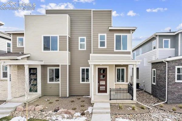 a front view of a house with entrance