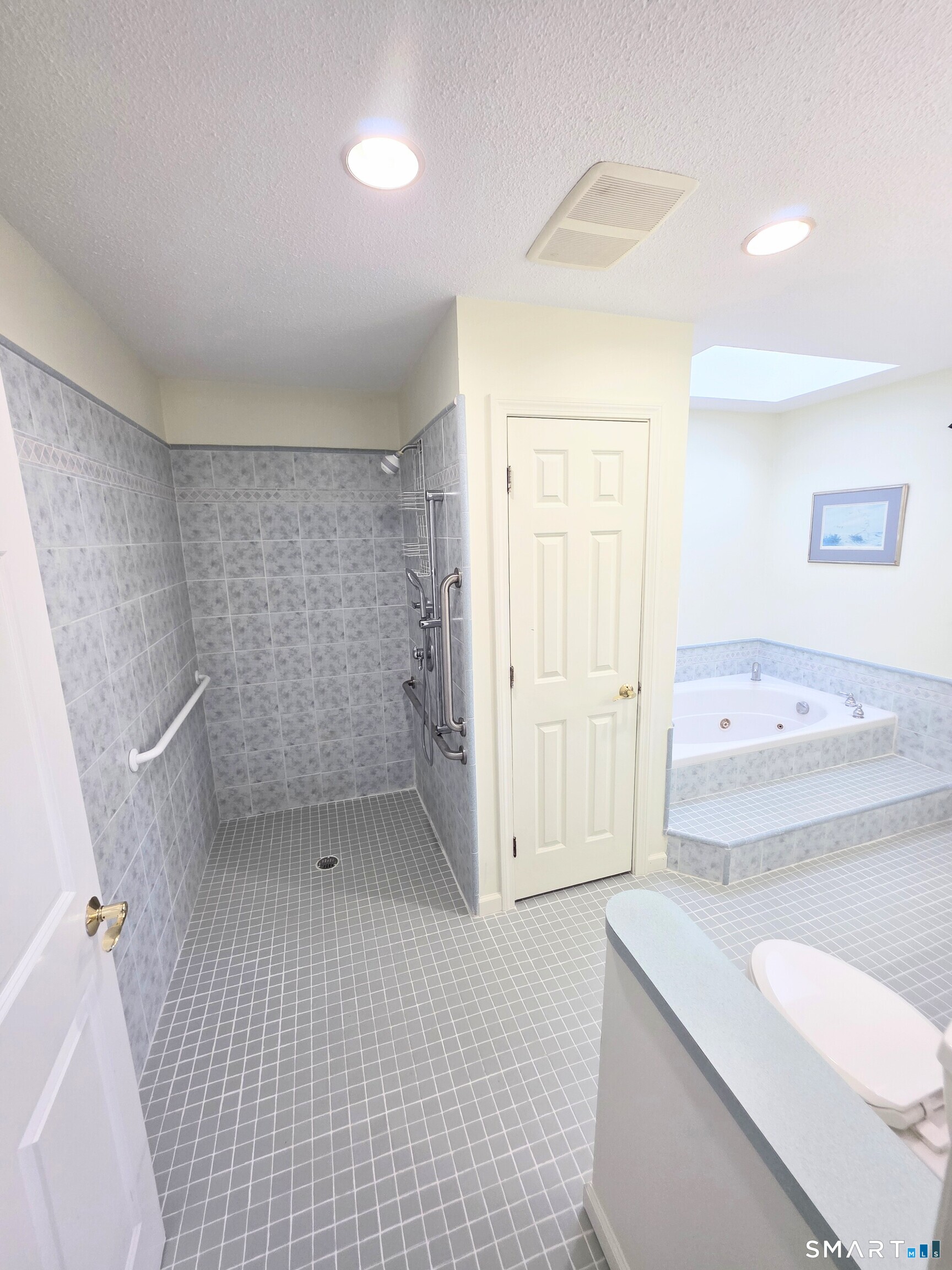 44 Steele Street New Britain, CT 06052 - Photo 14 of 27 a bathroom with a sink a toilet and shower
