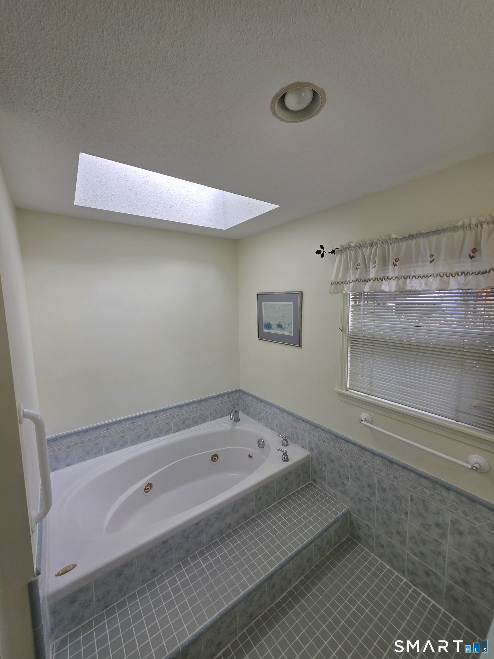 44 Steele Street New Britain, CT 06052 - Photo 18 of 27 a bathroom with a tub and shower