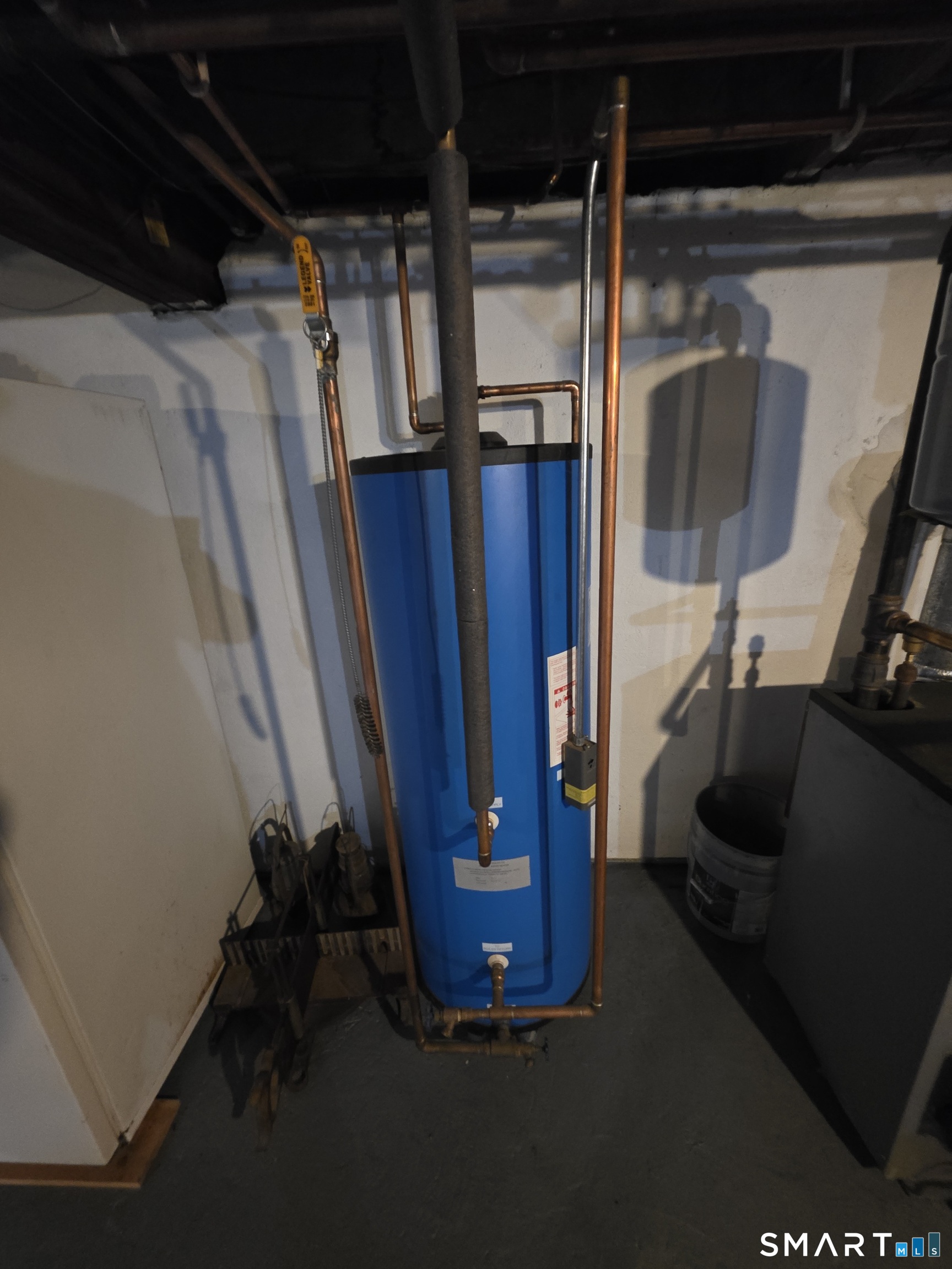 44 Steele Street New Britain, CT 06052 - Photo 23 of 27 a view of walk in closet with clothes and shoes