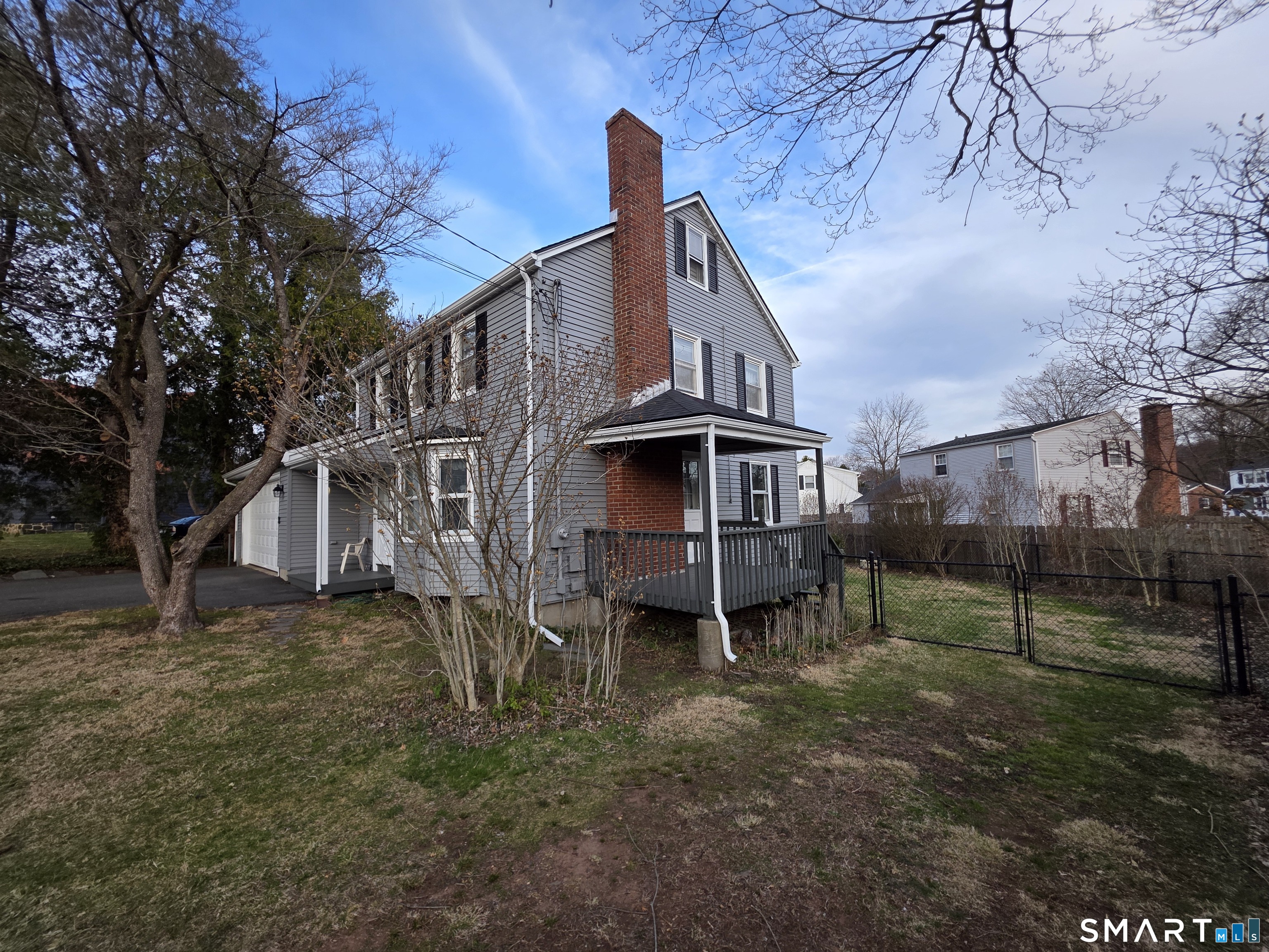44 Steele Street New Britain, CT 06052 - Photo 5 of 27 a view of a house with a yard