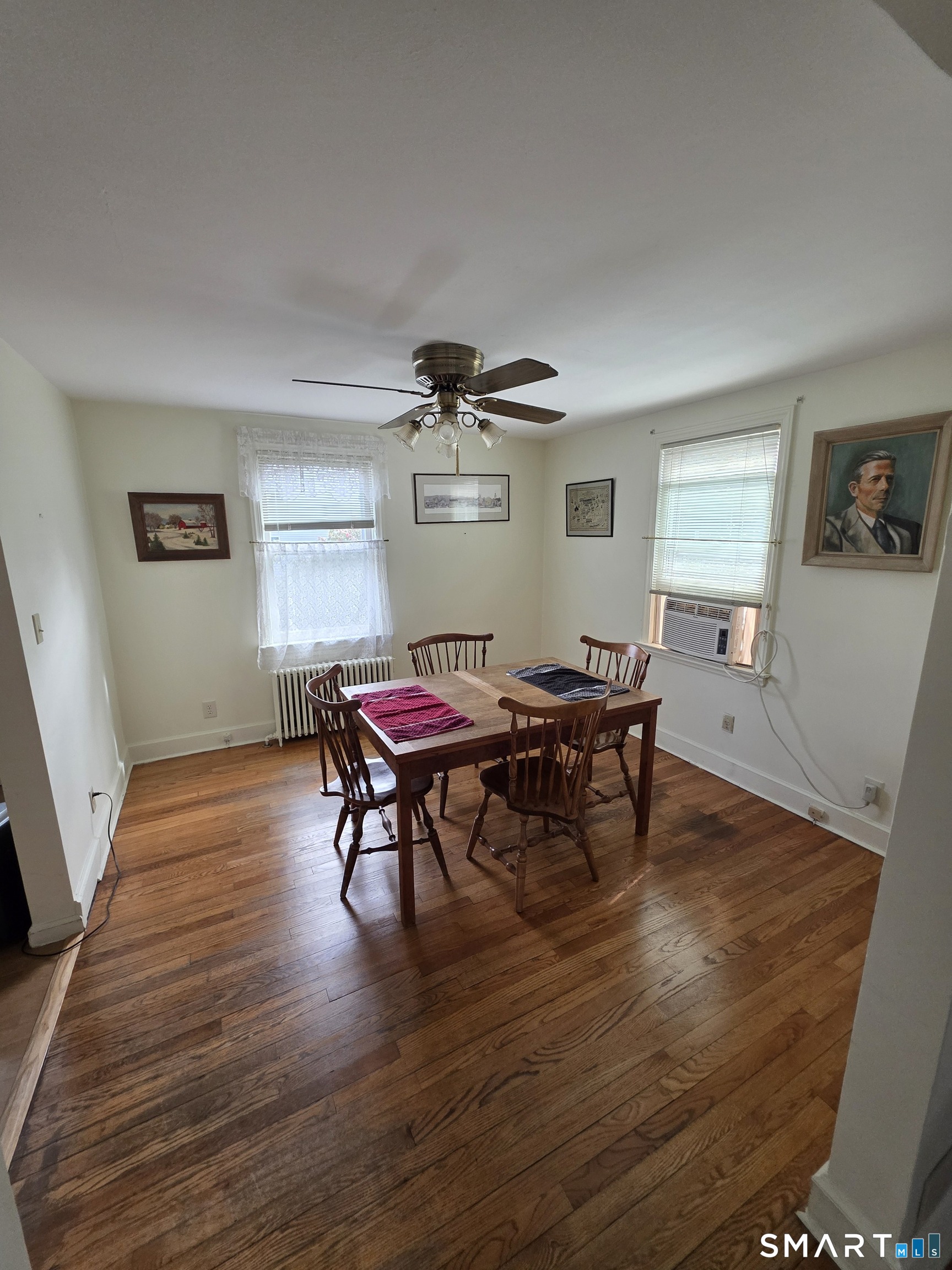 44 Steele Street New Britain, CT 06052 - Photo 9 of 27 a living room with furniture and a wooden floor