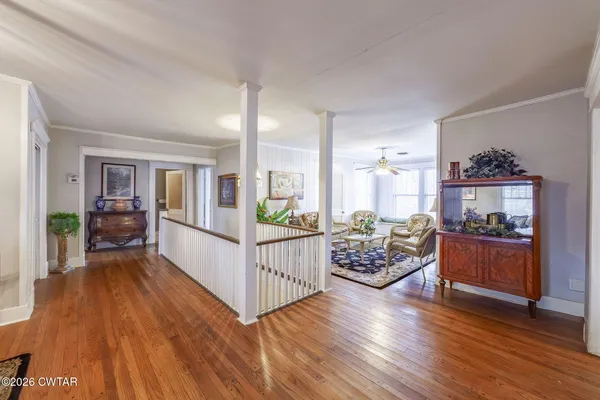 a view of a living room and dining room