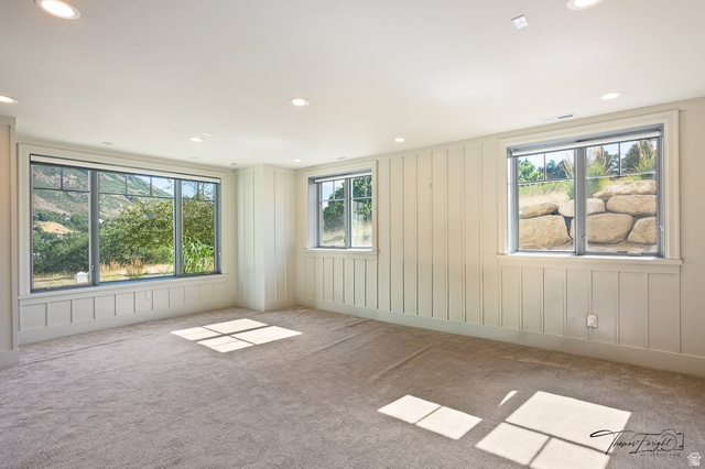 3 Carriagewood Cove, Unit 1088 Sandy, UT 84092 - Photo 56 of 79 Spacious room featuring board and batten wainscoting, recessed lighting, and light-toned carpeting