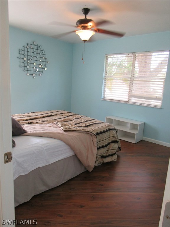 18415 Miller Road Fort Myers, FL 33967 - Photo 15 of 21 a bedroom with a bed and a window
