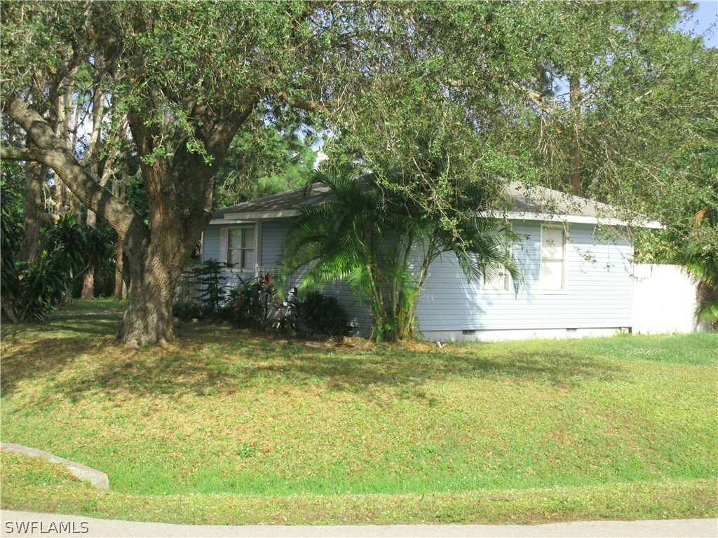18415 Miller Road Fort Myers, FL 33967 - Photo 19 of 21 a view of swimming pool with a yard