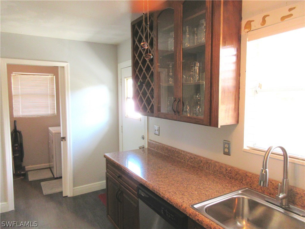 18415 Miller Road Fort Myers, FL 33967 - Photo 8 of 21 a bathroom with a sink and a mirror