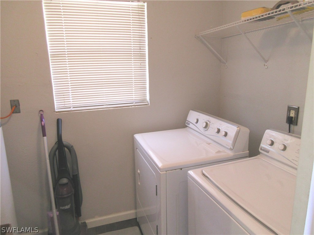 18415 Miller Road Fort Myers, FL 33967 - Photo 9 of 21 a utility room with dryer and washer