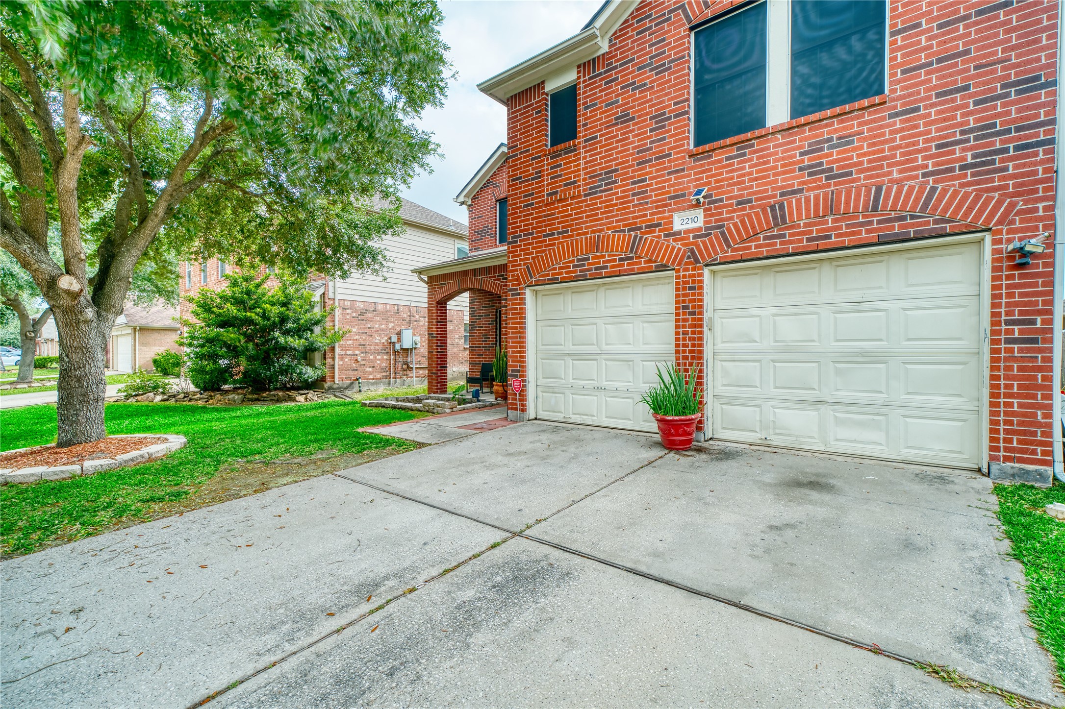 2210 Mountain Ranch Drive Houston, TX 77049 - Photo 6 of 36 a view of a house with a yard and street