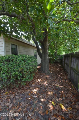 a backyard of a house with lots of green space