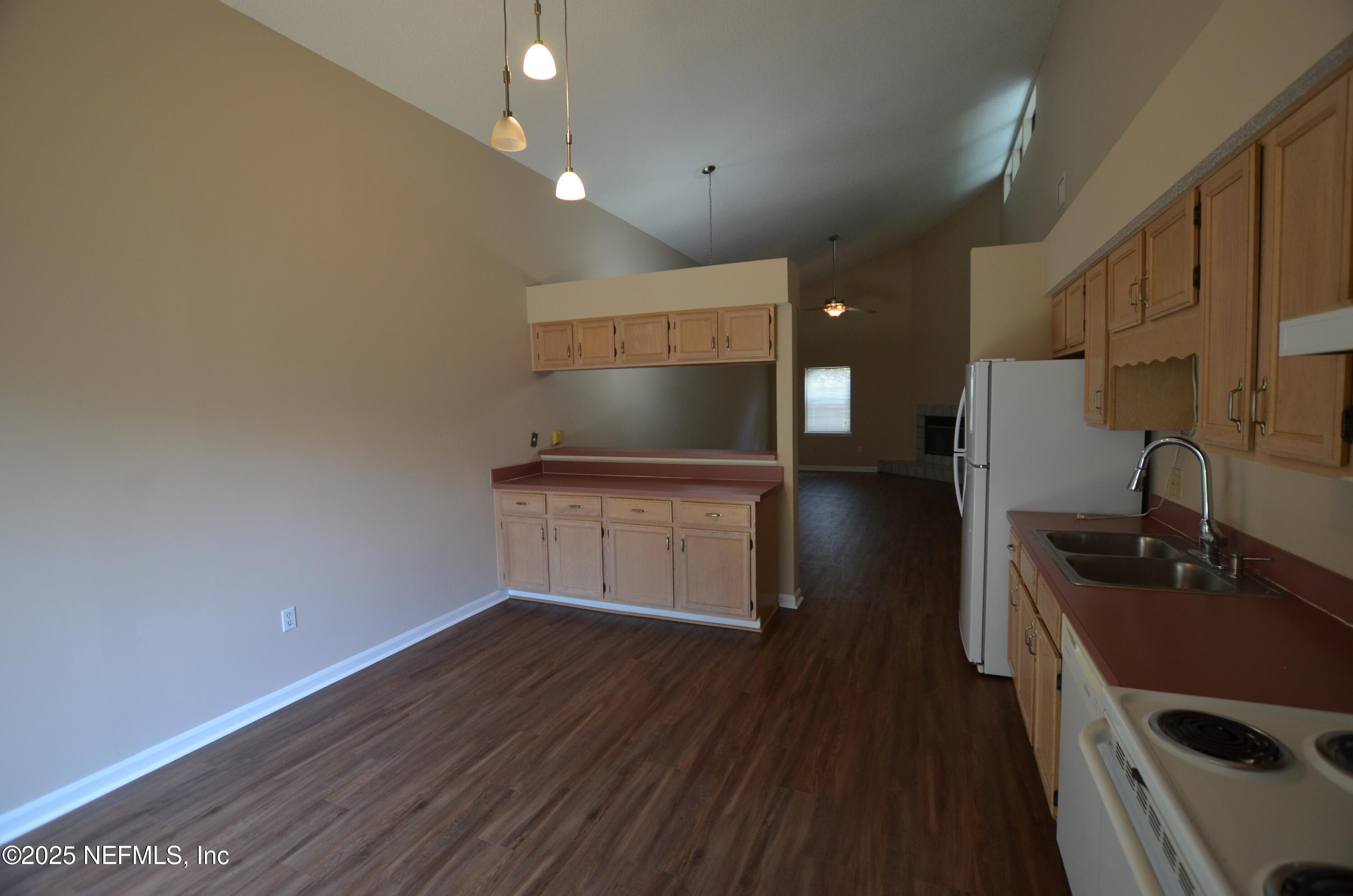 362 Filmore Drive Jacksonville, FL 32225 - Photo 6 of 13 a kitchen with granite countertop a sink and a stove top oven