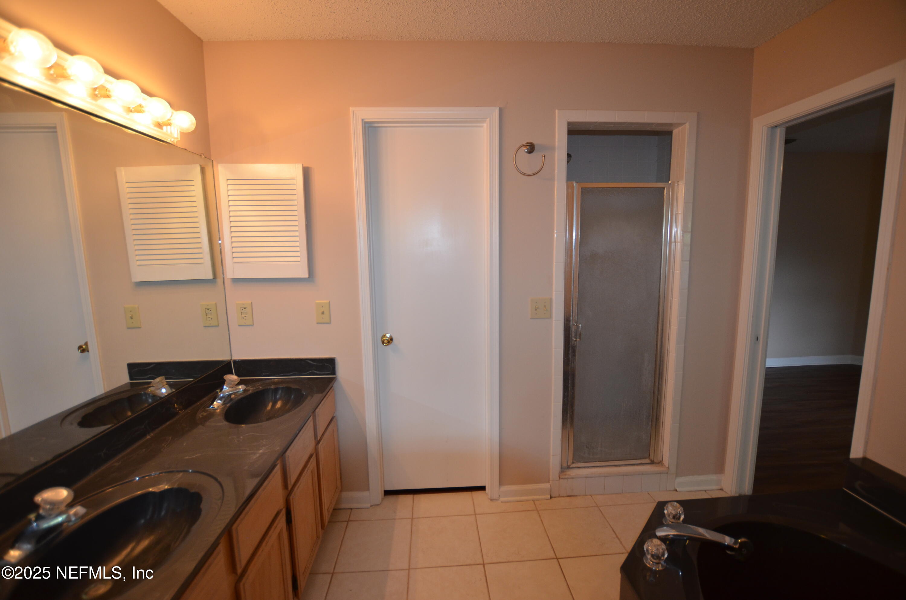 362 Filmore Drive Jacksonville, FL 32225 - Photo 9 of 13 a kitchen with a sink and a refrigerator